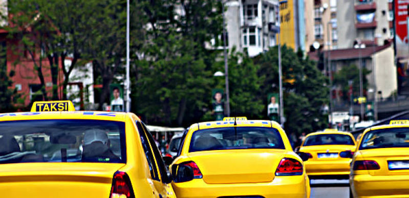 Propaganda Atrás Taxi Valor Praia Grande - Propaganda de Taxidoor Empresa